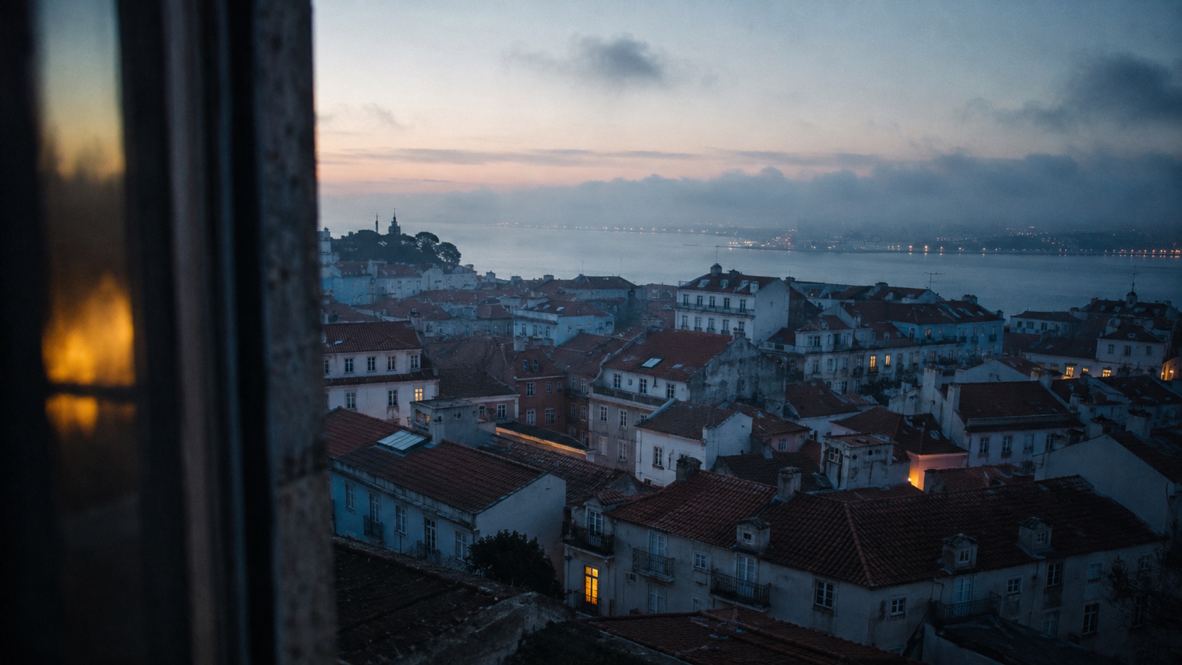 Lisbon rooftops at dawn